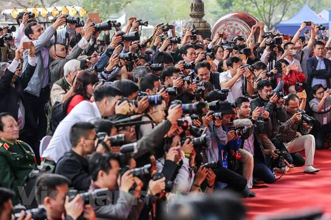 Ảnh minh họa. (Nguồn: Vietnam+) Báo chí góp phần tạo sự chuyển biến về hành vi trong xã hội ảnh 2