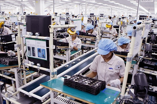 San xuất linh kiện điện tử. (Nguồn: TTXVN) Giải pháp chủ yếu thực hiện Kế hoạch phát triển kinh tế-xã hội 2023 ảnh 2