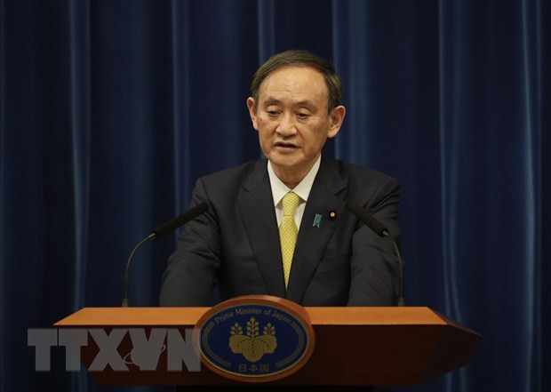 Thủ tướng Nhật Bản Suga Yoshihide. (Ảnh: AFP/TTXVN) Nhật Bản sẽ dừng cấp vốn ODA cho các dự án điện than ảnh 1