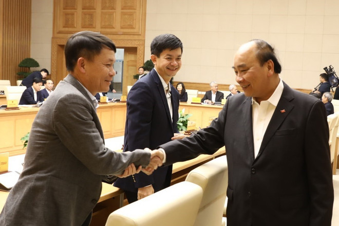 Thủ tướng Nguyễn Xuân Phúc với các đại biểu dự phiên họp. (Ảnh: Văn Điệp/TTXVN) Thủ tướng Nguyễn Xuân Phúc: Chống nCoV, phải chống cả 'virus trì trệ' ảnh 1