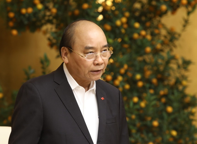 Thủ tướng Nguyễn Xuân Phúc chủ trì phiên họp. (Ảnh: Văn Điệp/TTXVN) Thủ tướng Nguyễn Xuân Phúc: Chống nCoV, phải chống cả 'virus trì trệ' ảnh 2