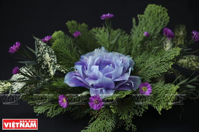 Rực rỡ, tinh xảo những đóa hoa được làm từ quả đu đủ xanh ảnh 11