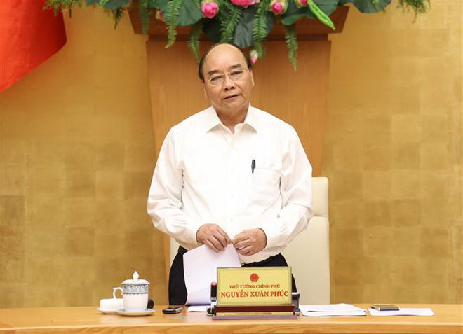 Thủ tướng: Dịch COVID-19 dù phức tạp nhưng đang trong tầm kiểm soát ảnh 1