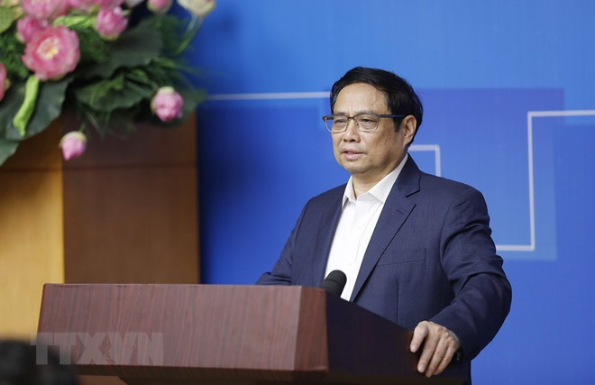 Thủ tướng Phạm Minh Chính phát biểu tại hội nghị. (Ảnh: Dương Giang/TTXVN) Thủ tướng: Còn nhiều vấn đề cần giải quyết để đô thị là nơi đáng sống ảnh 2