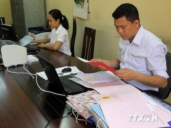 Từ 7/2015, Hà Nội sẽ phạt các tổ chức chưa đăng ký đất đai ảnh 1