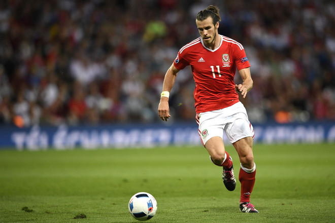Cầu thủ Gareth Bale của Xứ Wales trong trận đấu với Nga ở Toulouse, Pháp ngày 20/6. (Nguồn: AFP/TTXVN) Đội hình tiêu biểu sau vòng bảng EURO 2016: Vắng bóng Ronaldo ảnh 3