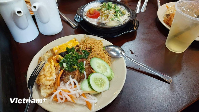 Attractive Saigon broken rice dish. (Photo: Vietnam+) vnp-com-tam-7743.jpg