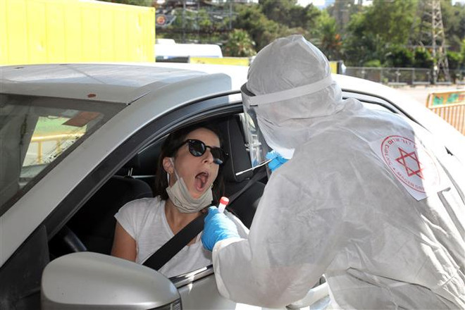 Israel phê duyệt kế hoạch nhận diện thành phố lây nhiễm COVID-19 ảnh 1