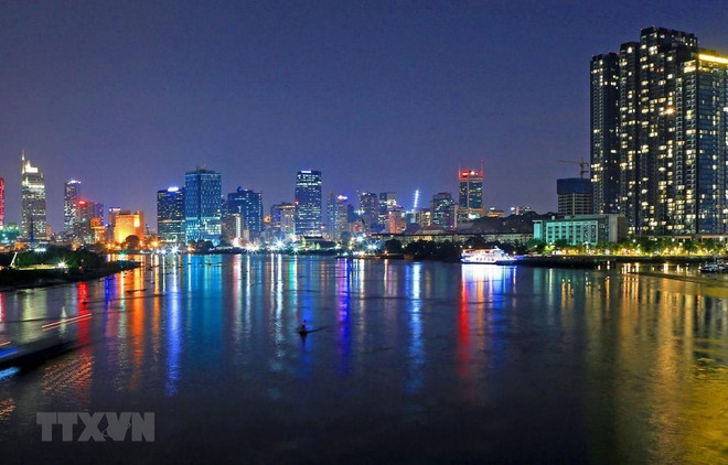Một góc trung tâm Thành phố Hồ Chí Minh. (Nguồn: TTXVN) Nghị quyết của Bộ Chính trị về nâng cao hiệu quả đầu tư nước ngoài ảnh 2
