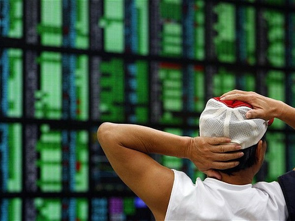 Chứng khoán châu Á phản ứng tích cực trước quyết định của Fed ảnh 1