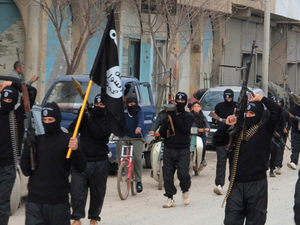 Các tay súng IS. (Nguồn: Reuters) Mỹ không hợp tác với Syria để chống Nhà nước Hồi giáo tự xưng ảnh 1