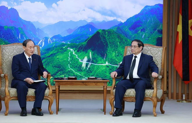 Thủ tướng Phạm Minh Chính tiếp cựu Thủ tướng Nhật Bản Suga Yoshihide sang dự Lễ Quốc tang Tổng Bí thư Nguyễn Phú Trọng. (Ảnh: Dương Giang/TTXVN) ttxvn_cuu thu tuong nhat ban 2.jpg