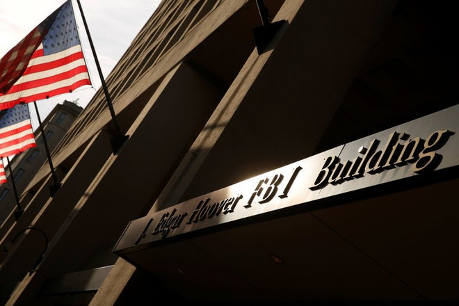 (Nguồn: Reuters) Cựu nhân viên FBI nhận tội tiết lộ tài liệu mật cho phóng viên ảnh 1
