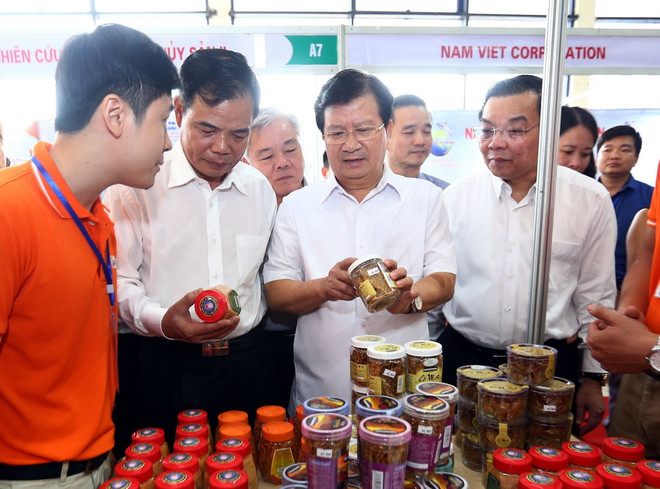 Phó Thủ tướng thăm Hội chợ cá tra và các sản phẩm thủy sản Việt Nam ảnh 1