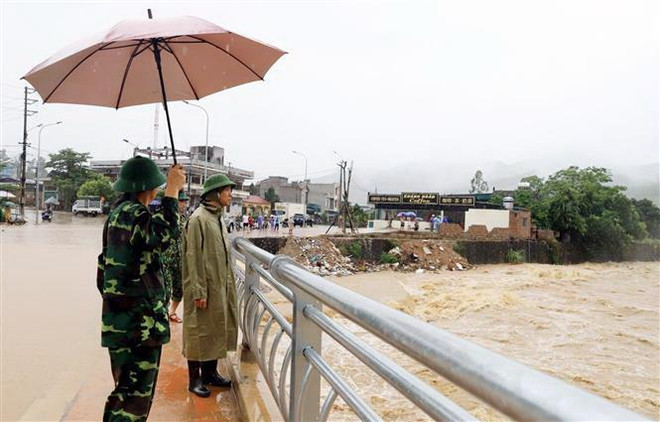 Lũ nước sông Tiên Yên (đoạn Bình Liêu) lên cao vào sáng 10/9. (Ảnh: TTXVN) Mưa lớn gây thiệt hại ở nhiều địa phương của Hà Giang, Quảng Ninh ảnh 2