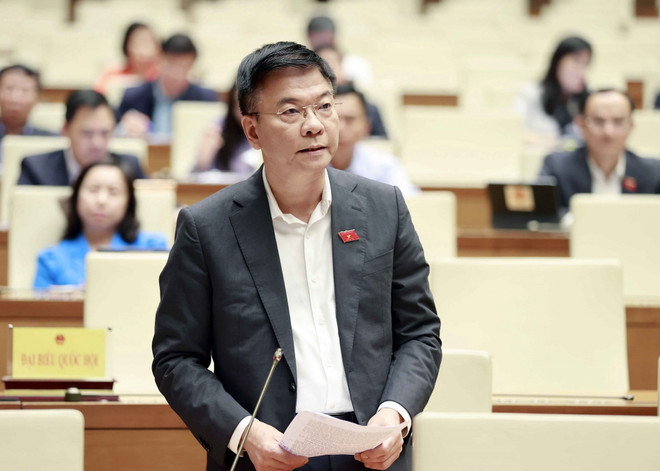 Bộ trưởng Bộ Tư pháp Lê Thành Long tham gia trả lời chất vấn, giải trình những vấn đề có liên quan. (Ảnh: Doãn Tấn/TTXVN) Chú trọng thu hồi tài sản trong các vụ án tham nhũng, kinh tế ảnh 3