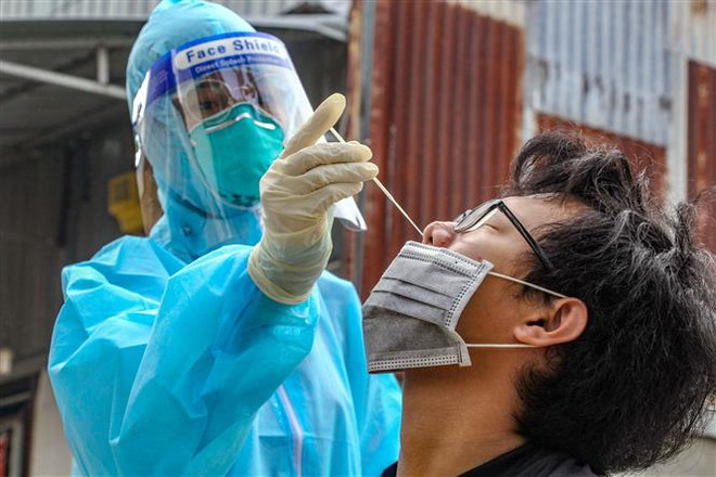 Cả nước ghi nhận 14.835 ca mắc mới COVID-19 và 216 ca tử vong ảnh 1