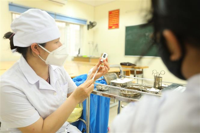 Có 10 ca tử vong do COVID-19, giảm một nửa so với trung bình 7 ngày ảnh 1