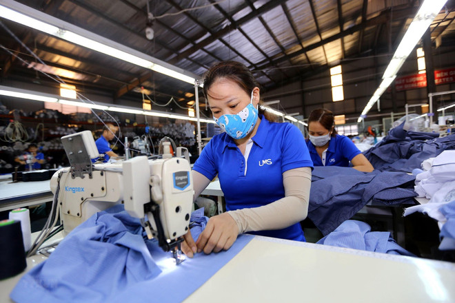 Ảnh minh họa. (Nguồn: TTXVN) Nhiều doanh nghiệp kỳ vọng hiệp định RCEP là 'vùng lánh nạn' ảnh 1