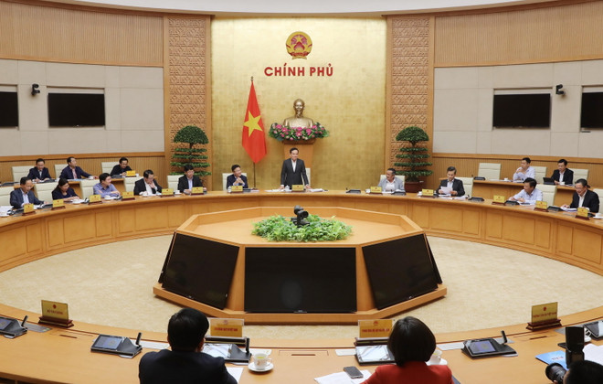 Phó Thủ tướng Trần Lưu Quang chủ trì cuộc họp. (Ảnh: Lâm Khánh/TTXVN) Phó Thủ tướng: Đẩy mạnh chuyển đổi số trong việc phổ biến pháp luật ảnh 1