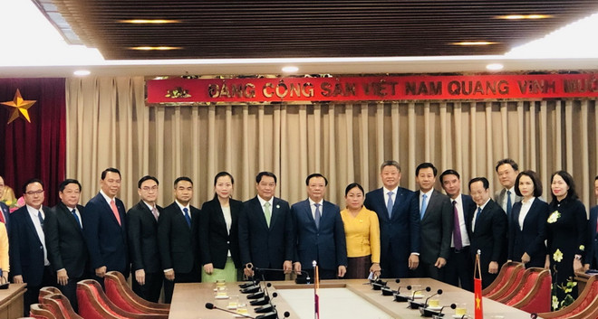 Phấn đấu đưa quan hệ Hà Nội-Vientiane trở thành hình mẫu hợp tác ảnh 1