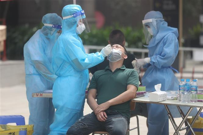 Ngày 13/8, ghi nhận 9.180 ca mắc mới COVID-19, bổ sung 275 ca tử vong ảnh 1