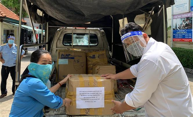 Doanh nghiệp trong khu vực giãn cách ở TP.HCM nỗ lực duy trì sản xuất ảnh 1