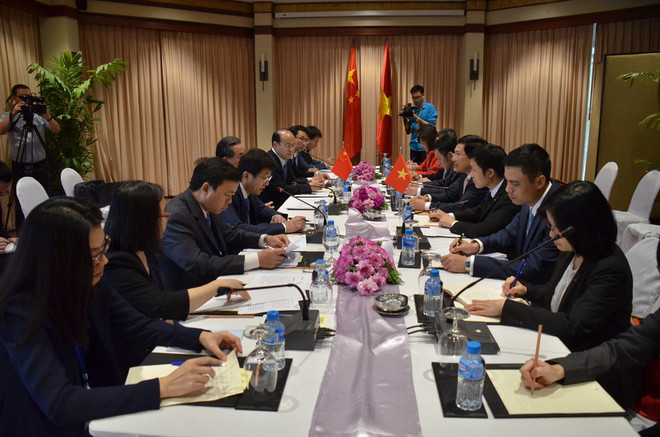 Quang cảnh Phó Thủ tướng, Bộ trưởng Ngoại giao Phạm Bình Minh gặp Bộ trưởng Ngoại giao Trung Quốc Vương Nghị. (Ảnh: Hưng Đa/TTXVN) Phó Thủ tướng Phạm Bình Minh gặp Bộ trưởng Ngoại giao Trung Quốc, Lào ảnh 1