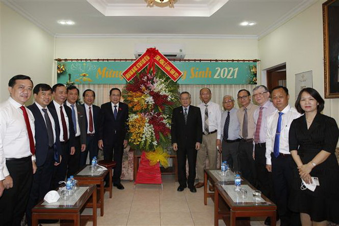 Phó Chủ tịch Quốc hội chúc mừng Giáng sinh ở TP.HCM và Tiền Giang ảnh 1