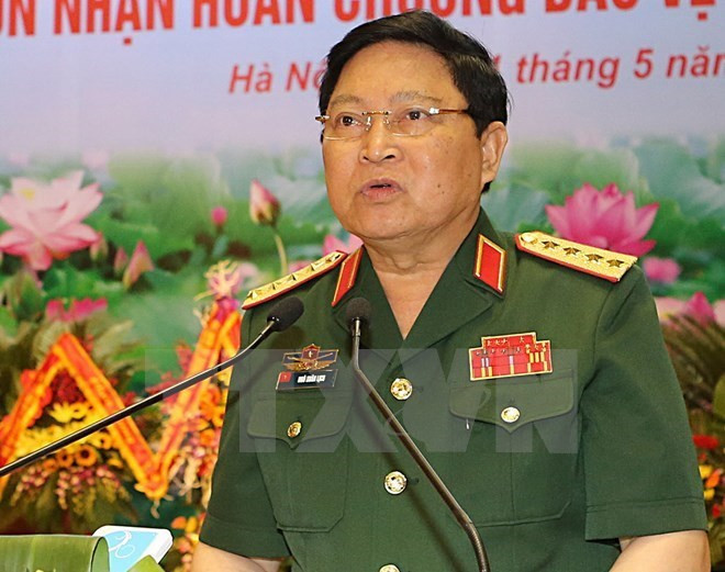Đại tướng Ngô Xuân Lịch, Bộ trưởng Bộ Quốc phòng. (Ảnh: Trọng Đức/TTXVN) Thành tựu và kinh nghiệm trong 30 năm đổi mới quân sự, quốc phòng ảnh 1
