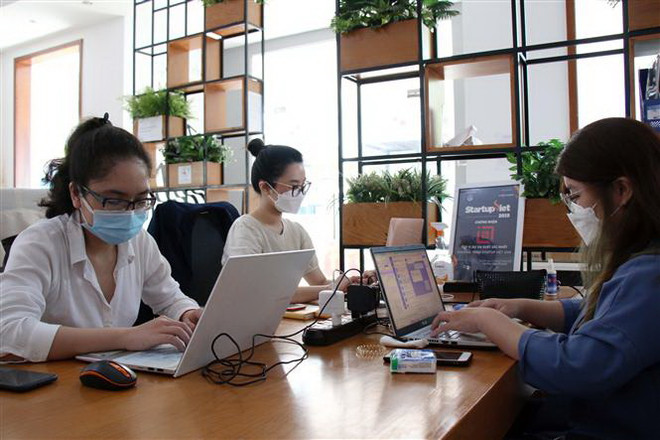 Saigon Innovation Hub là không gian làm việc chung của nhiều startup tại Thành phố Hồ Chí Minh trong những năm qua. (Ảnh: Tiến Lực/TTXVN) Thúc đẩy đổi mới sáng tạo, tạo động lực tăng trưởng mới ảnh 3