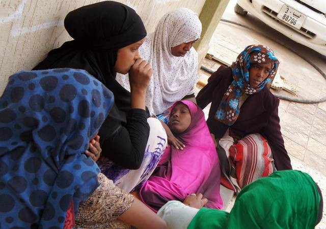 Người di cư Libya. (Nguồn: McClatchy) Italy và EU hỗ trợ Libya trong cuộc chiến chống nạn buôn người ảnh 1