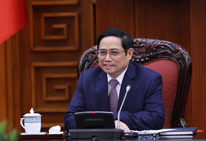 Thủ tướng Phạm Minh Chính phát biểu tại buổi tiếp Đại sứ Liên hiệp Vương quốc Anh và Bắc Ireland tại Việt Nam Gareth Ward. (Ảnh: Dương Giang/TTXVN) Việt Nam đề nghị Anh xem xét chuyển giao công nghệ sản xuất vaccine ảnh 2