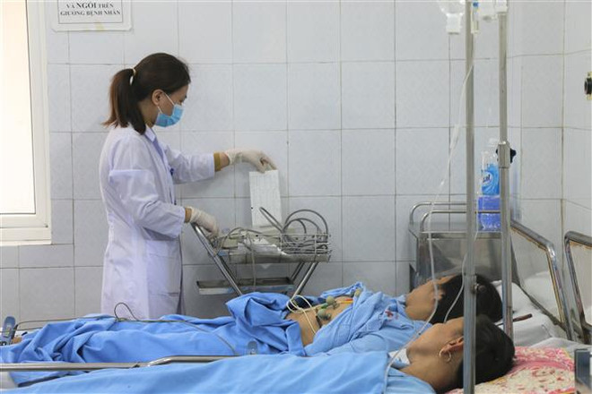 Các công nhân phản ứng sau tiêm vaccine phòng COVID-19 đã ổn định sức khỏe. (Ảnh: Hoa Mai/TTXVN) Thanh Hóa: Các công nhân bị phản ứng sau tiêm vaccine được xuất viện ảnh 1