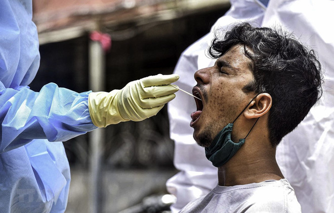 Số ca mắc bệnh COVID-19 tại Ấn Độ đã vượt 3 triệu người ảnh 1