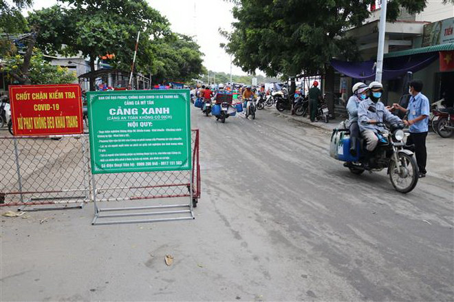 Mô hình 'Cảng xanh' an toàn, không có dịch được thiết lập tại cảng cá Mỹ Tân (xã Thanh Hải, huyện Ninh Hải). (Ảnh: Nguyễn Thành/TTXVN) Phát sinh ổ dịch mới, Ninh Thuận bổ sung các biện pháp phù hợp ảnh 1
