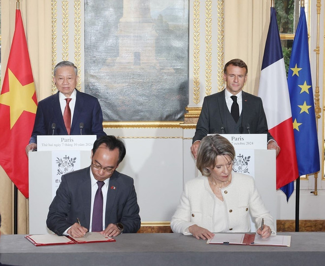 ttxvn_Vietnam_phap_tong bi thu_tong thong Phap 2.jpg