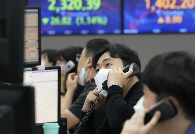 Các thị trường chứng khoán châu Á chịu sức ép trong phiên sáng 27/3 ảnh 1