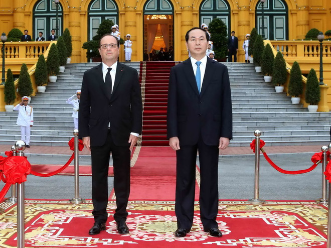 [Photo] Chủ tịch nước Trần Đại Quang đón Tổng thống Pháp Hollande ảnh 5