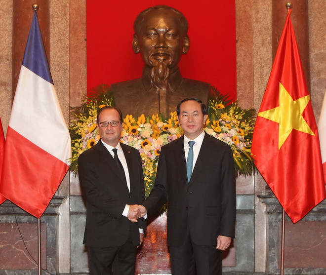 [Photo] Chủ tịch nước Trần Đại Quang đón Tổng thống Pháp Hollande ảnh 10