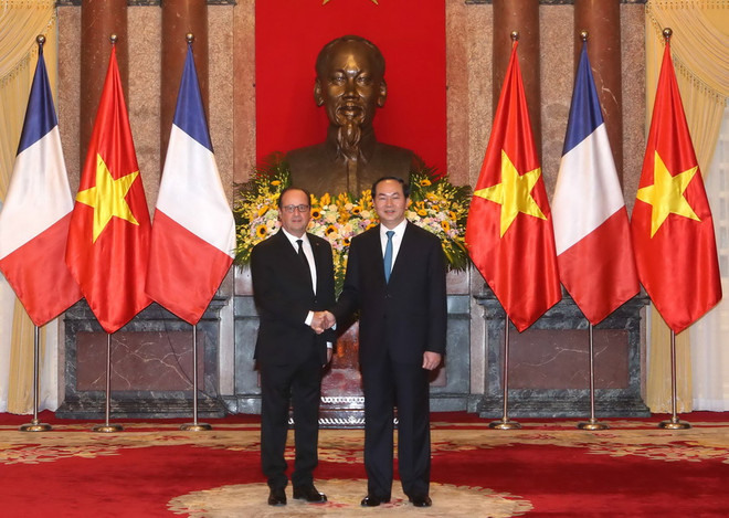 [Photo] Chủ tịch nước Trần Đại Quang đón Tổng thống Pháp Hollande ảnh 9