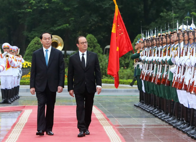 [Photo] Chủ tịch nước Trần Đại Quang đón Tổng thống Pháp Hollande ảnh 7