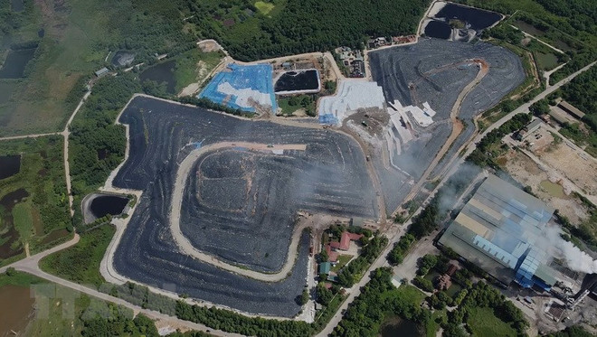 Hà Nội: Cam kết thu nhận rác bình thường tại bãi rác Xuân Sơn từ 30/6 ảnh 1