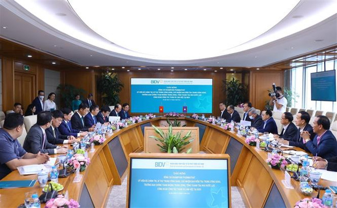 Tăng cường hợp tác Việt Nam-Lào trong lĩnh vực ngân hàng, điện lực ảnh 1