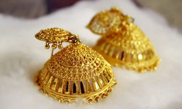 Giá vàng thế giới giảm nhẹ trong phiên giao dịch ngày 22/6 ảnh 1