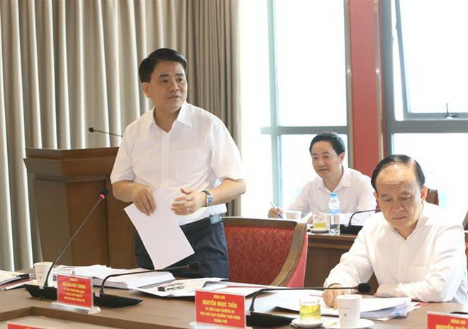 Chủ tịch Ủy ban Nhân dân Thành phố Hà Nội Nguyễn Đức Chung phát biểu. (Ảnh: Văn Điệp/TTXVN) Hà Nội kiến nghị sớm ban hành chính sách quản lý chất lượng không khí ảnh 2