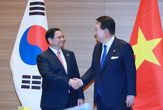 Thủ tướng Phạm Minh Chính và Tổng thống Hàn Quốc Yoon Suk-yeol. (Ảnh: Dương Giang/TTXVN) Thủ tướng Phạm Minh Chính hội kiến Tổng thống Hàn Quốc Yoon Suk-yeol ảnh 2