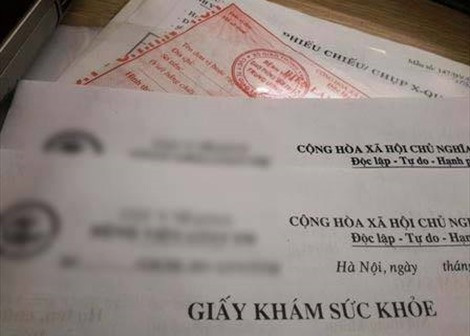 Hà Nội: Truy tố 8 đối tượng trong đường dây làm giả giấy khám sức khỏe ảnh 1
