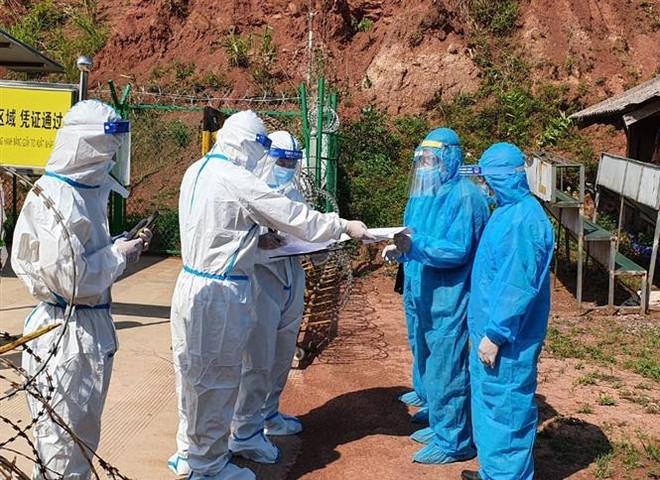 Điện Biên: Bàn giao 2 đối tượng người Trung Quốc nhập cảnh trái phép ảnh 1