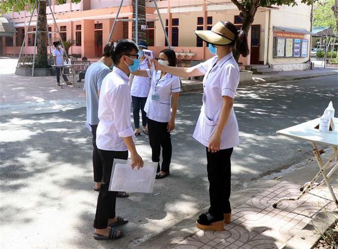 352 thí sinh ở Quảng Ngãi dừng thi do liên quan đến bệnh nhân COVID-19 ảnh 1